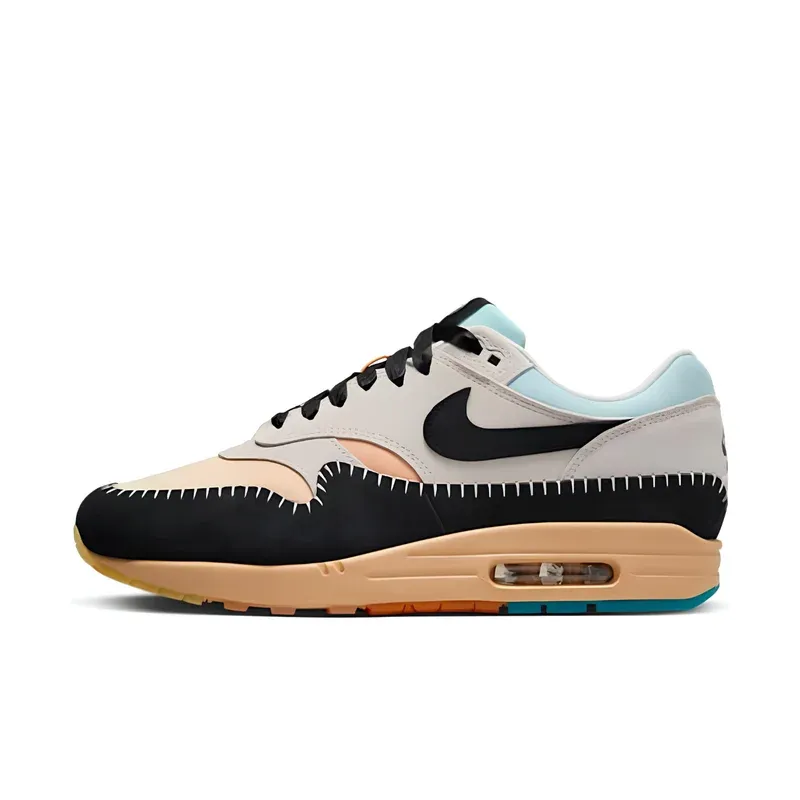 Nike Air Max 1 '87 N7 u kombinaciji bež i crne boje — bočni pogled