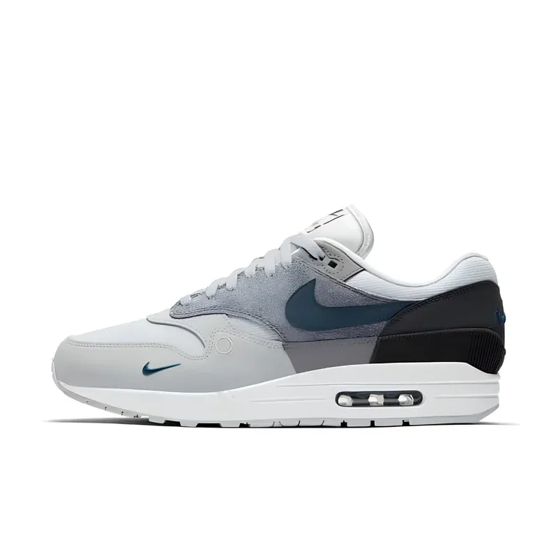 Nike Air Max 1 London u kombinaciji sive i bele boje — bočni pogled