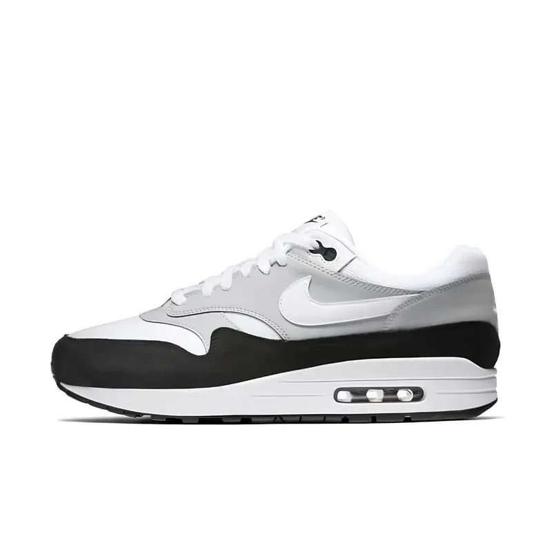Nike Air Max 1 Wolf Grey Black u kombinaciji bele i crne boje — bočni pogled
